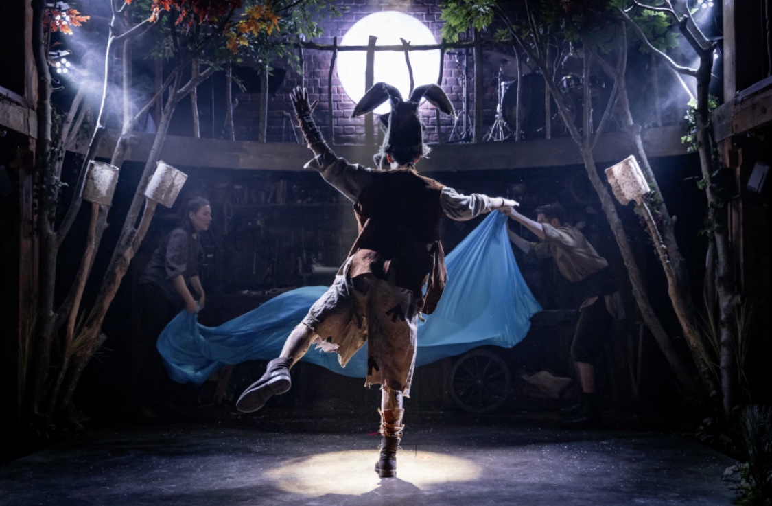 A production shot of Pinocchio jumping into the sea with a donkey mask on
